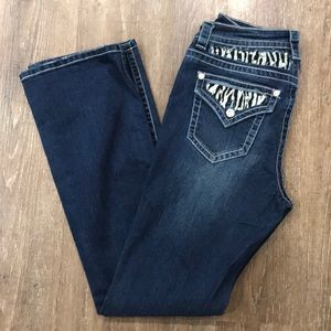 Woman’s jeans with zebra as bling accents
